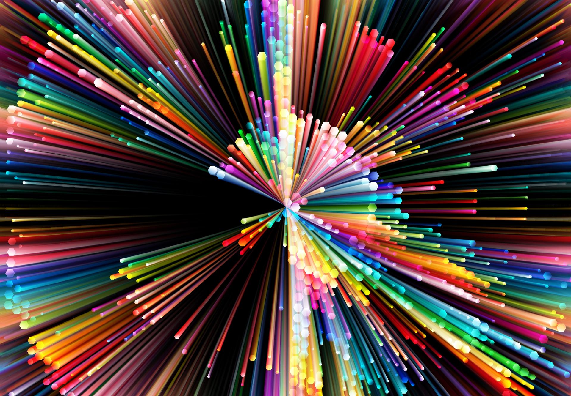 multi colored rods expanding from a center point against a black background